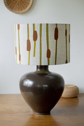 Grecian Lampbase in Grizzly Brown with Raupo lamp shade.